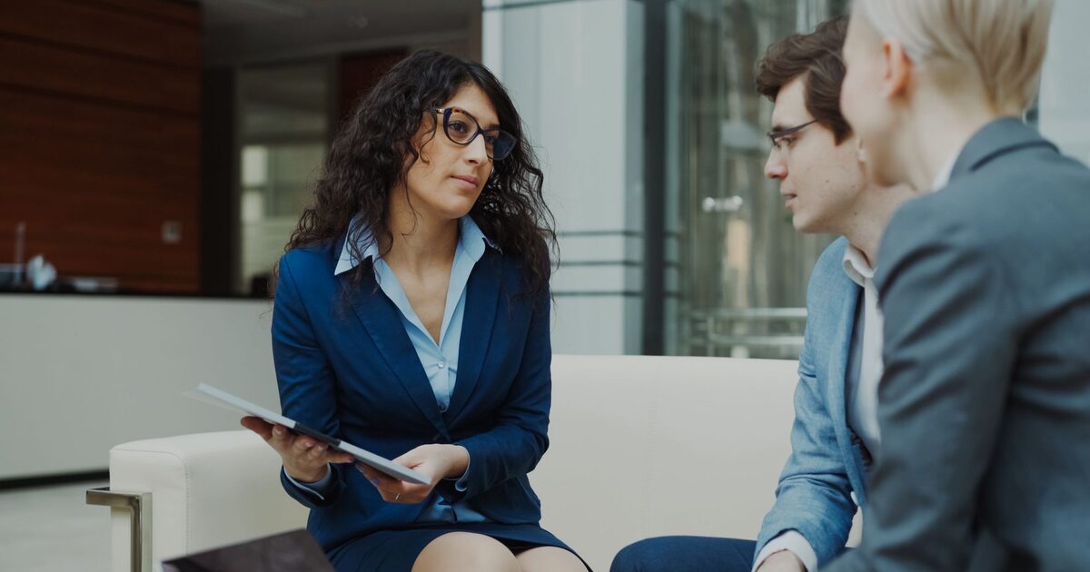 Workforce consultant advising two company managers