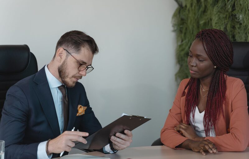 Recruiter reviewing a candidate CV during a job interview