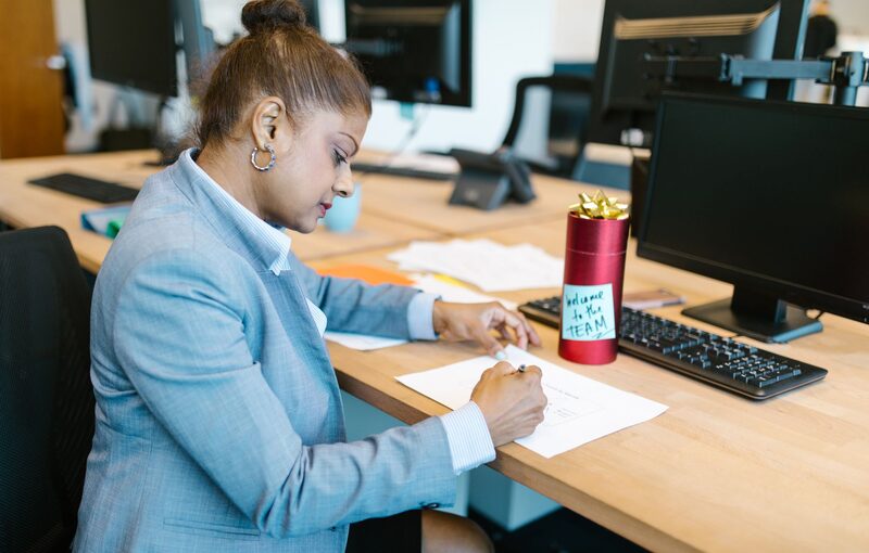 New employee at their desk on the first day at work